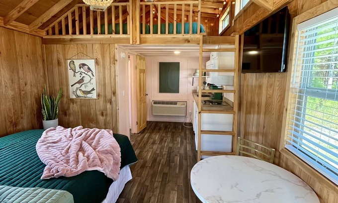 Bolivia RV Rental | Deluxe Loft Cabin - Upscale Cozy Loft Cabin