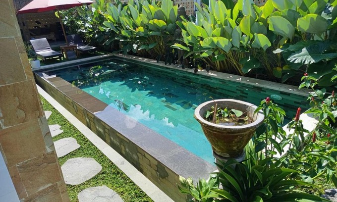 Mambal House | Deluxe Room Puri Uma Dewi room only