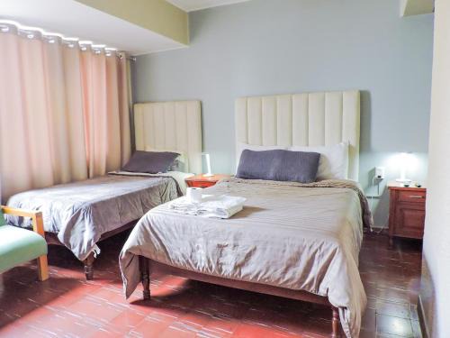 Tarija Apartment | Descansa como en Casa, Dormitorio con Cocina