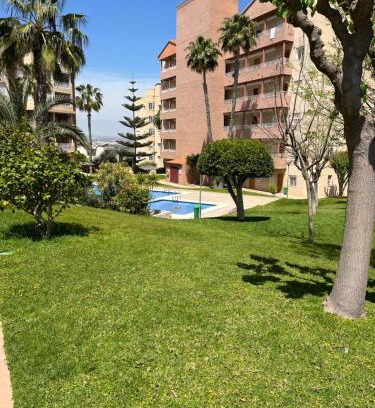 Arenales del Sol Apartment | Descanso y jardines con piscinas