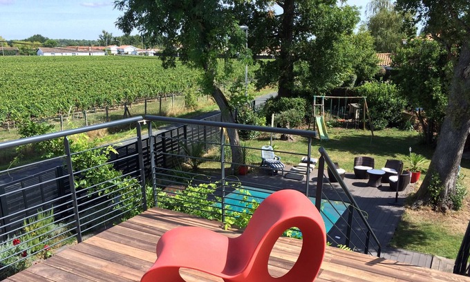 Pessac Villa | Design villa in the vineyards of Chateau Pape Clement with pool and spa