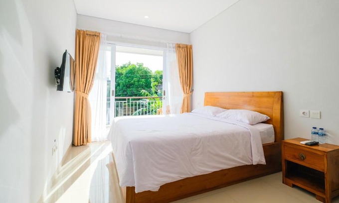 Sunset Road Hotel | Dharma Guest House Seminyak RedPartner