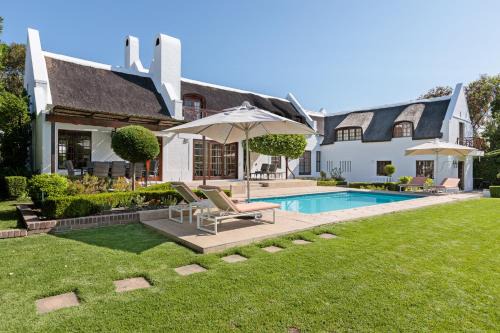 Somerset West House | Die Rietdak - Reetdachhaus mit vier Schlafzimmern