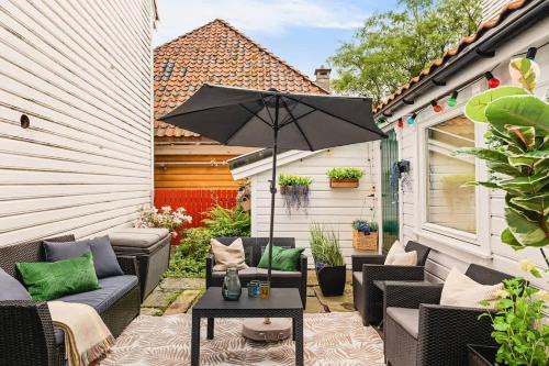 Sentrum House | Dinbnb Apartments I Family Dream in Bergen I Playroom I Private Garden