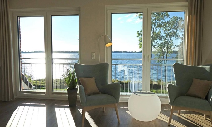 Klein Wittensee Apartment | Direct lakeside location, fantastic lake view, balcony, Baltic Sea 12 km, barrel sauna, balcony