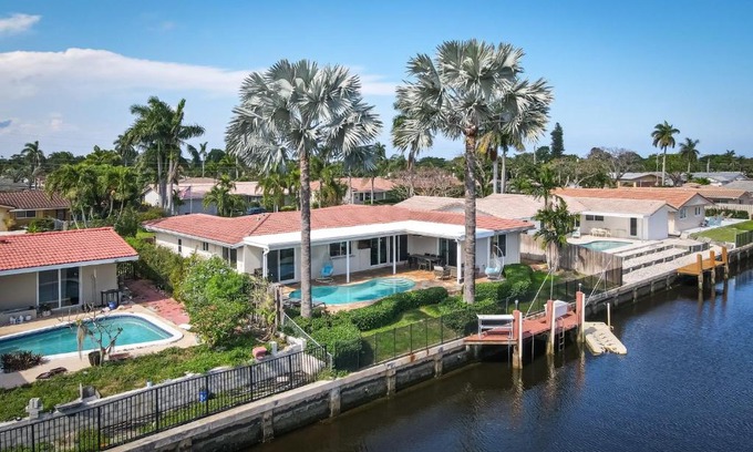 Coral Ridge Isles House | Dockside Daydreams - Canalfront and Pool Oasis