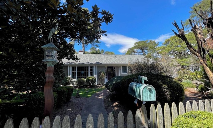 The Pines House | Dog-Friendly Beach Getaway with Koi Pond, Patio & Walkable to Town!