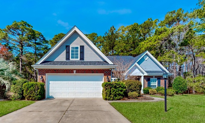 Calabash House | Dog-friendly coastal home with lovely patio, pool, & games - near beaches & golf