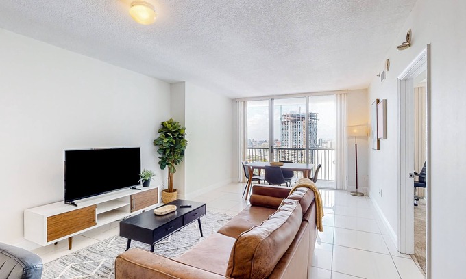 Edgewater Apartment | Dog-friendly condo with balcony, pool, & partial ocean view - walk to beach