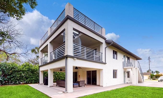 Isles of Capri House | Dog-friendly duplex with a patio, deck, washers, dryers, & central AC
