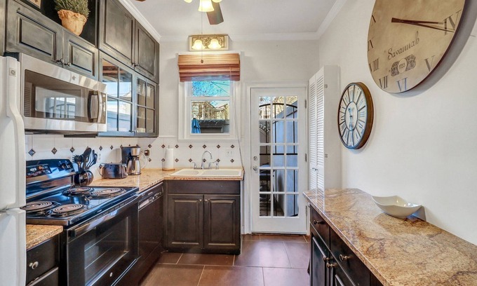 Old West Broad Neighborhood House | Dog Friendly Historic Home by Forsyth w/Private Courtyard by Lucky Savannah