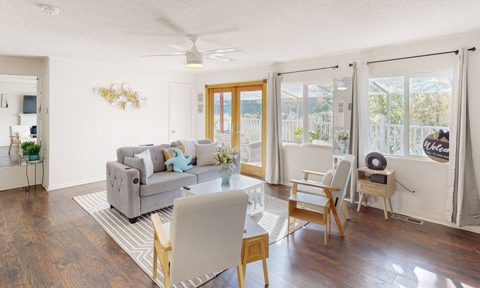 Shoreline House | Dog-friendly lake view home with kitchen & kitchenette, patio, sunroom
