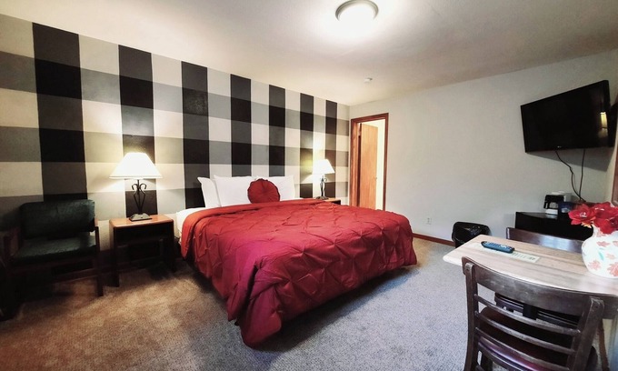 Ironwood Apartment | Dog Friendly main level king room inside the Lodge at North Ironwood Acres resort.