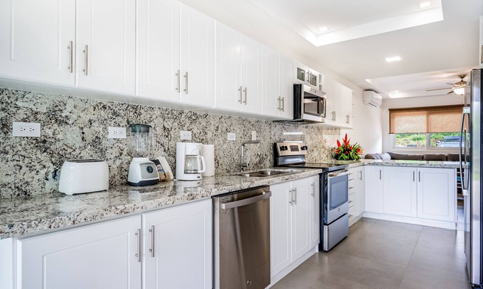 Villarreal Villa | Dog-friendly tropical villa with a pool, patio, balcony, & washer/dryer