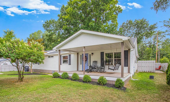 Paw Paw Lake House | Dog-friendly, updated home with deck, front porch, fire pit, WiFi, & fireplace