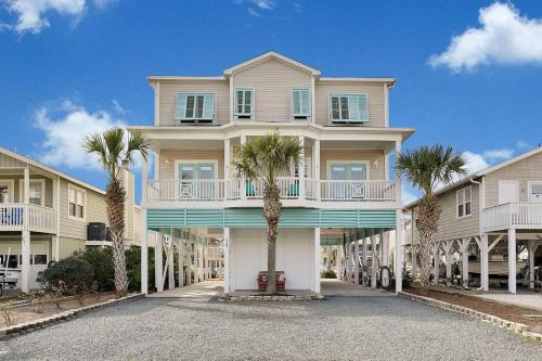 Ocean Isle Beach House | Doin` Time Canal Front home with elevator and extra living room