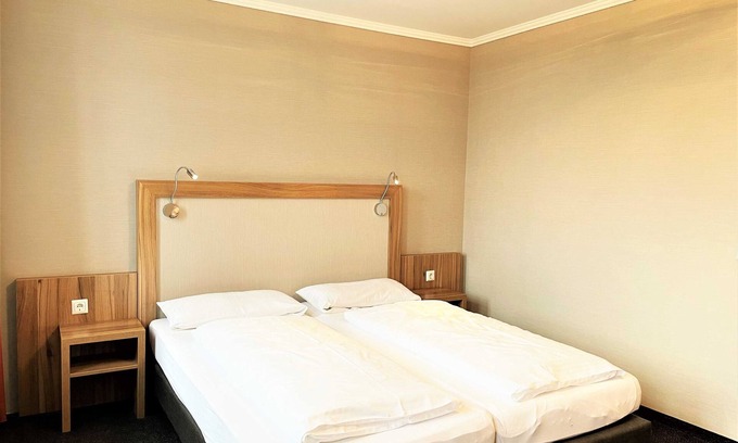 Lauta House | Doppelzimmer 212 - IBS Begegnungszentrum