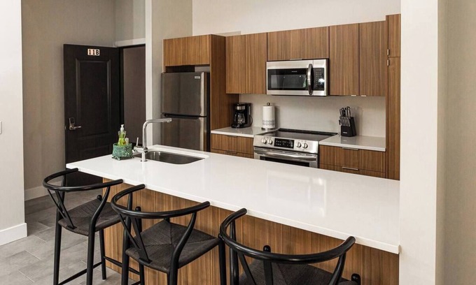 Grand Island Condo | Downtown Condo Under The Stars!