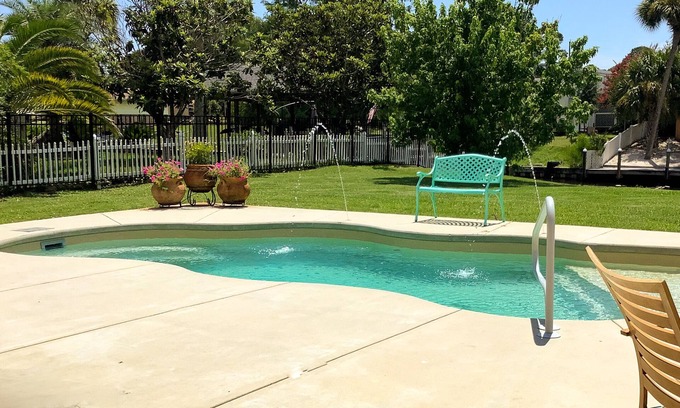 Ono Island House | DreamBoat Paradise-Spacious, Heated Pool, HotTub, Backyard Boat Slip, near Beach