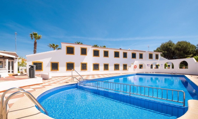 Cala'n Bosch Apartment | Dreamlike Apartment with Pool, Terrace & Wi-Fi