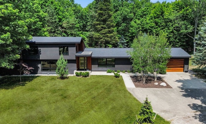 Holland House | Dunes Lodge is a newly-restored mid-century modern home in Laketown, Michigan