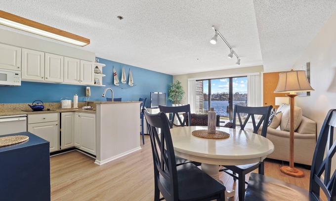 Charlevoix Condo | Edgewater Inn Condo #117C with Waterfront Access | Pool, Hot Tub, Sauna