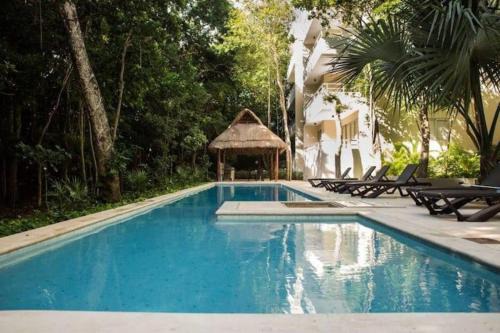 Akumal Apartment | Elegant 2BR Home in Sirenis with Pool BBQ Pkng close to the Beach