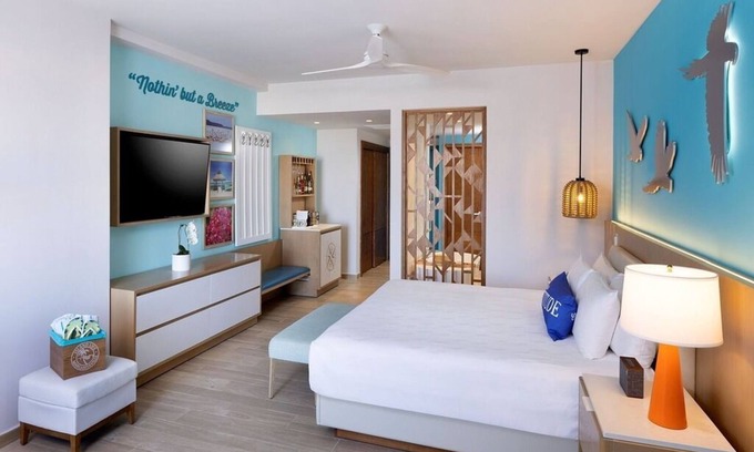 Punta Cana Apartment | Elegant Art Suite: Freestanding Tub, Rainforest Showers, and Premium Benefits