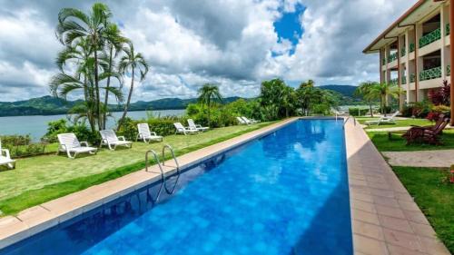 Playa Flamingo House | Elegant Condo with Brand-New Fixtures, Shaded Tropical Terrace, and Secluded Beach Access