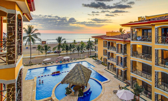 Barrio Los Villalobos Condo | Elegant, friendly beachfront condo with incredible ocean views & pool