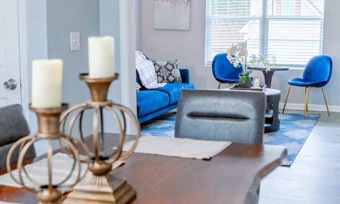 Fairburn House | Elegant Haven: Stylish Interiors with Serene Deck Views and Modern Comforts