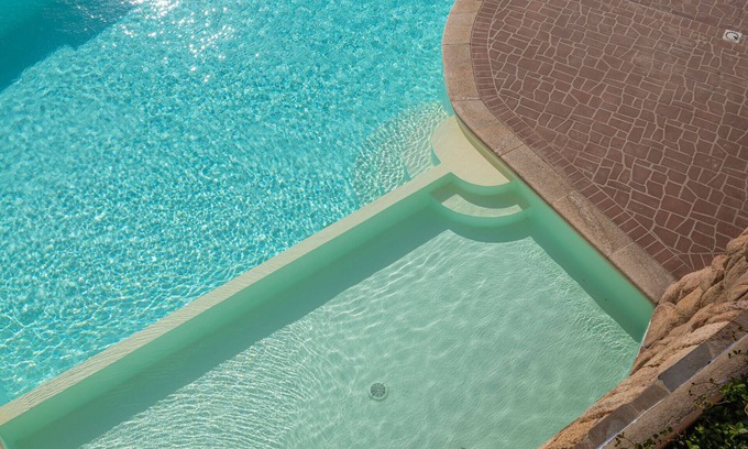 Baja Sardinia Apartment | Elegant Residence 2 Bedroom With Sea View Extra Bed Available