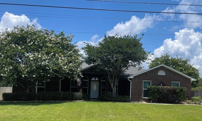 Navarre House | Elegant single level with 4 BR 3 BA, private oasis featuring a heated salt pool