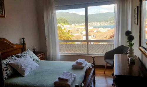 Muros Apartment | En Muros, céntrico, amplio, luminoso, vistas al mar