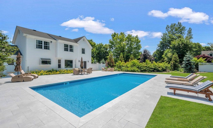 Southold House | Enchanting home with large backyard, stunning pool, expansive patio, and...
