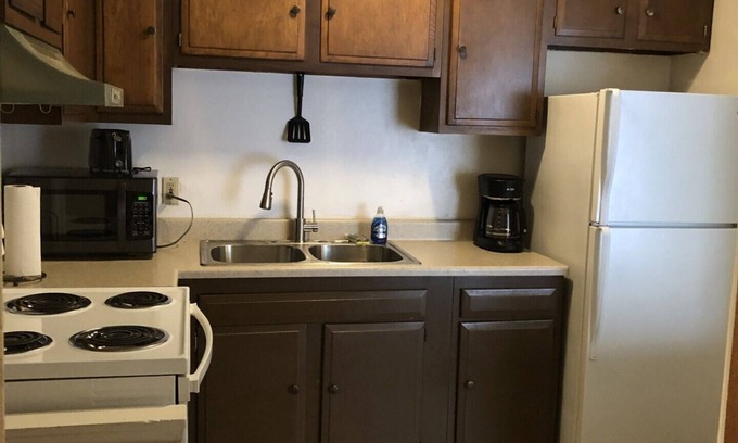 Maple Heights Apartment | English Tudor Apartment with Assigned Covered Parking