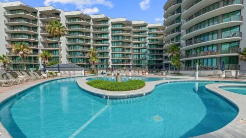 Orange Beach House | Enjoy a 3-bedroom Bayfront Condo with Lazy River Indoor Pool Jacuzzis and Community Boat Dock for Personal or Rented Boats Plus Redeem in Free Activity Deals Daily