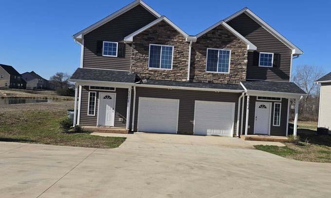 Harrisburg Condo | Enjoy a convenient 3BR House near —Charlotte Motor Speedway & Uptown Charlotte.