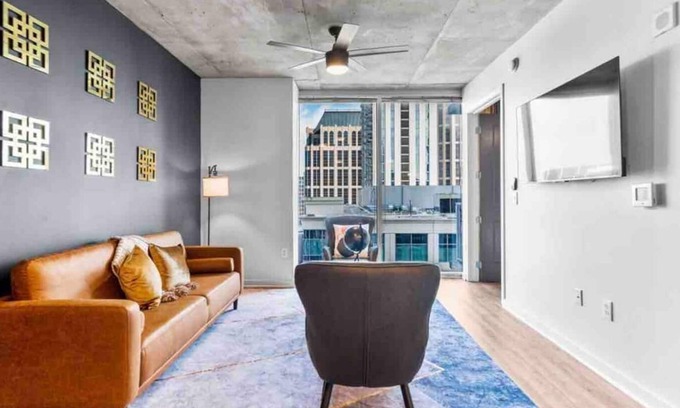 Midtown Apartment | Enjoy a stylish experience! This is a great location for anyone who is looking to relax and enjoy what the city has to offer.