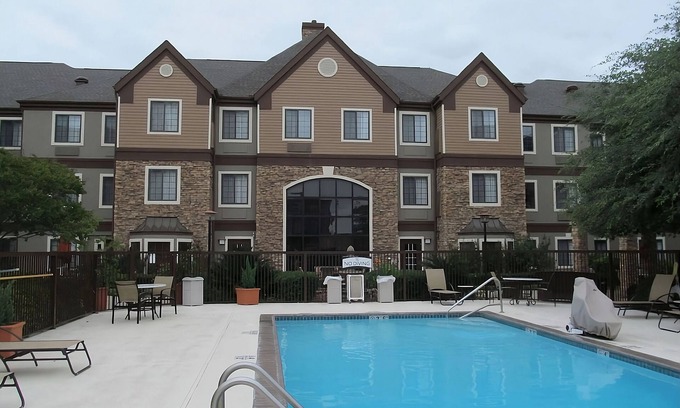 Vance Jackson Apartment | Enjoy San Antonio Hospitality! Complimentary Breakfast! Pool and Pets Allowed!