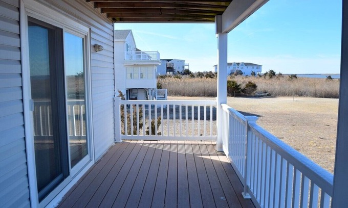 Dennisville Condo | Enjoy spectacular sunrises and sunsets from the large ocean & bay decks.