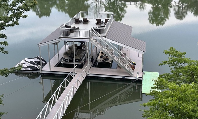 Blairsville House | Enjoy swimming and boating off our two story dock or relaxing in the hot tub.