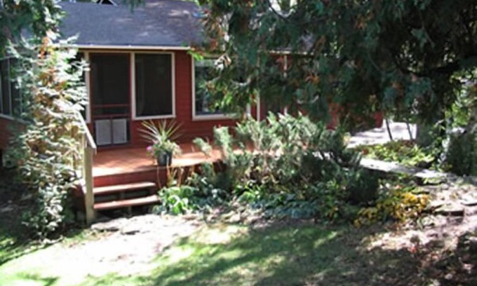 Baileys Harbor Cottage | Enjoy the view at this quaint lakefront cottage!