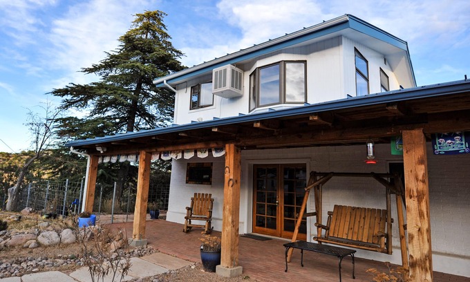 Tyrone Apartment | Enjoy Wildlife from Your Rocking Chair and Swinging Bench on Front Porch