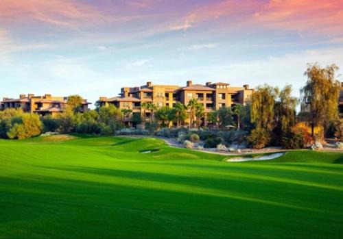 Palm Desert House | Escape the heat of Palm Desert in all the 3 pools with waterslide at this great resort 2BD condo