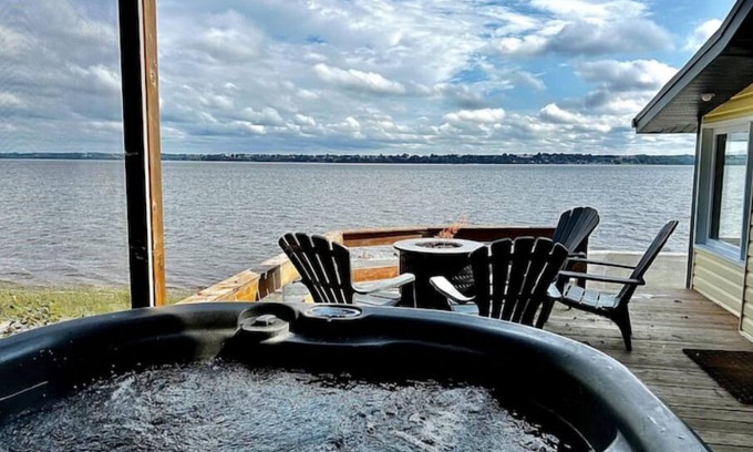 Grondines Cottage | Escape to Riverfront, Relax with Hot Tub, BBQ