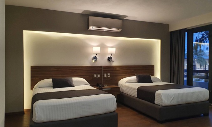 Las Americas Hotel | Estanza Hotel & Suites