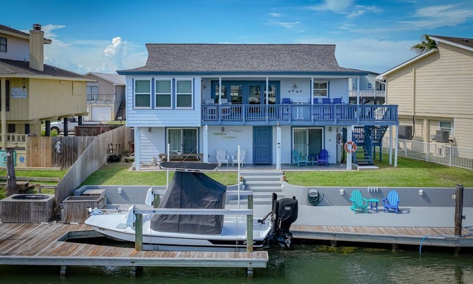 City-by-the Sea House | Estes Oasis! Canal front home with private lighted dock! Views! Foosball game