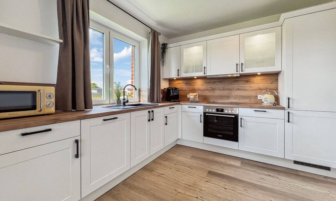 Hage House | Exclusive, modern new-build semi-detached house with garden for up to 8 people