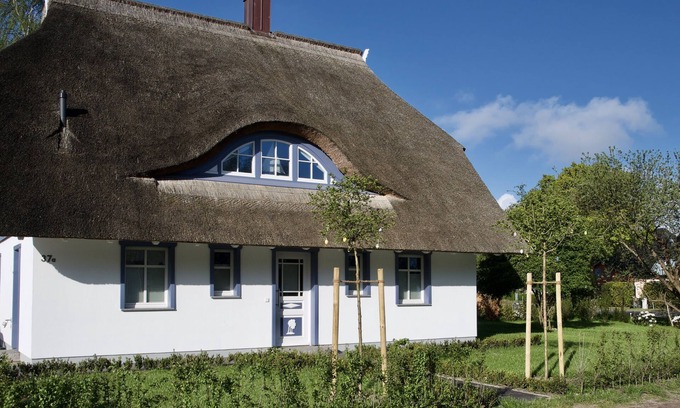 Born auf dem Darss House | Exclusive vacation home with large sauna area and cozy modern furnishings